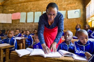 A Teacher And Her Students In Class Kenya
